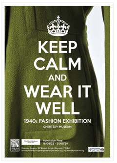 Postcard from Keep Calm & Wear it Well Exhibition showing detail from green coat and white wording.